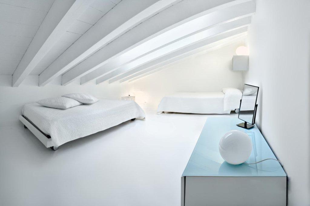 Postel nebo postele na pokoji v ubytování Loft di design a Loano in località Borgo Castello