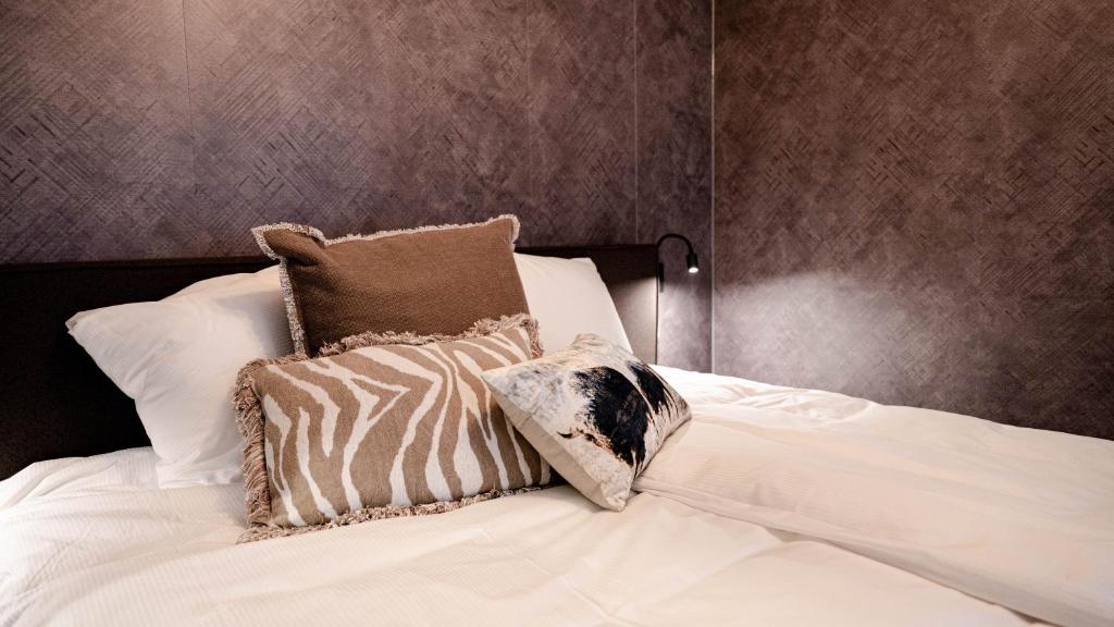 Postel nebo postele na pokoji v ubytování Hotel Biesbosch