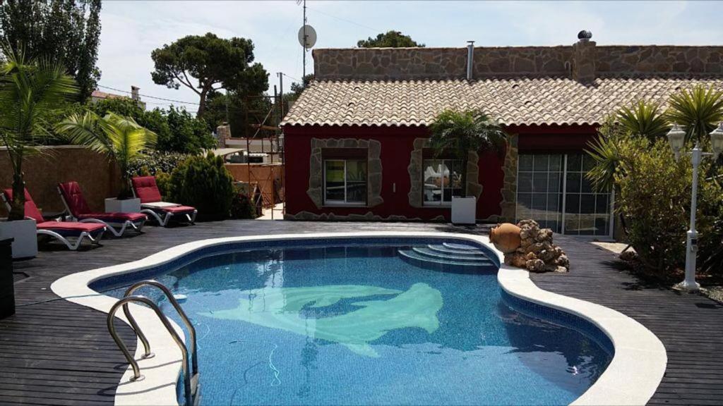 Bazén v ubytování Chalet Relax con piscina privada nebo v jeho okolí