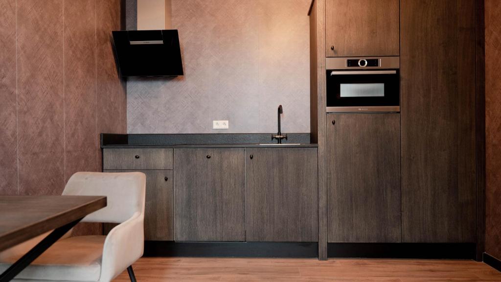 TV a/nebo společenská místnost v ubytování Hotel Biesbosch
