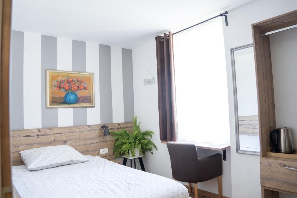 Postel nebo postele na pokoji v ubytování Hiša Poljana Rooms