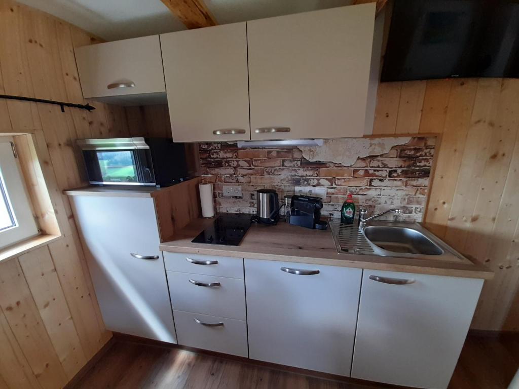 Kuchyň nebo kuchyňský kout v ubytování Ferienhütte Zetzhirsch