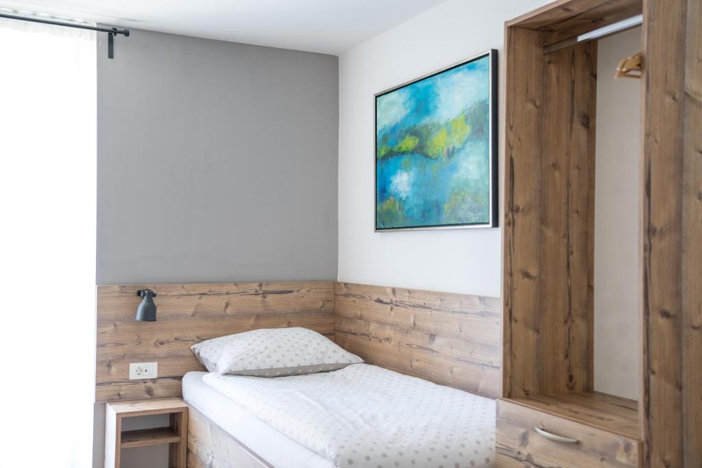Postel nebo postele na pokoji v ubytování Hiša Poljana Rooms