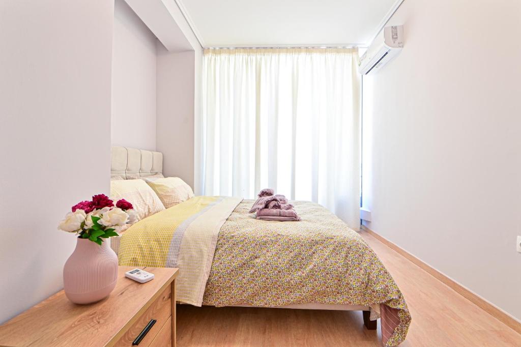 Postel nebo postele na pokoji v ubytování Modern flat in the heart of Port of Piraeus (D2)