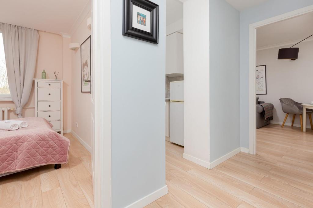 Posteľ alebo postele v izbe v ubytovaní Apartment Praga Afrykańska by Noclegi Renters