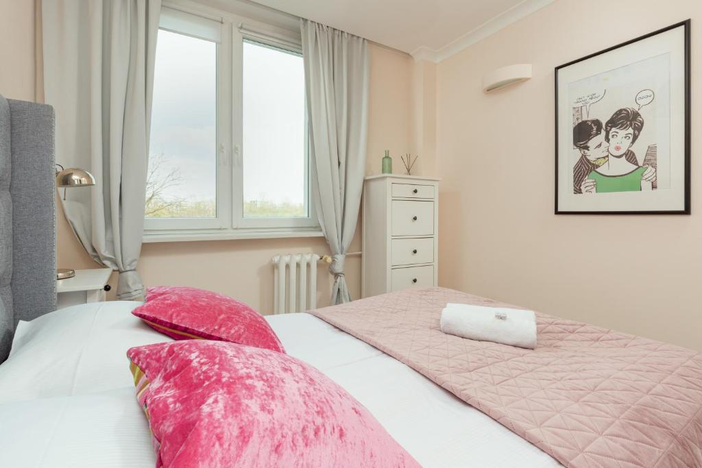 Posteľ alebo postele v izbe v ubytovaní Apartment Praga Afrykańska by Noclegi Renters