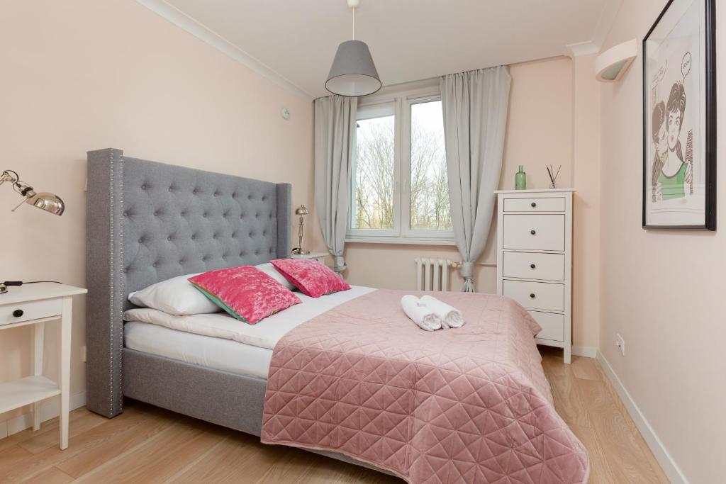 Posteľ alebo postele v izbe v ubytovaní Apartment Praga Afrykańska by Noclegi Renters