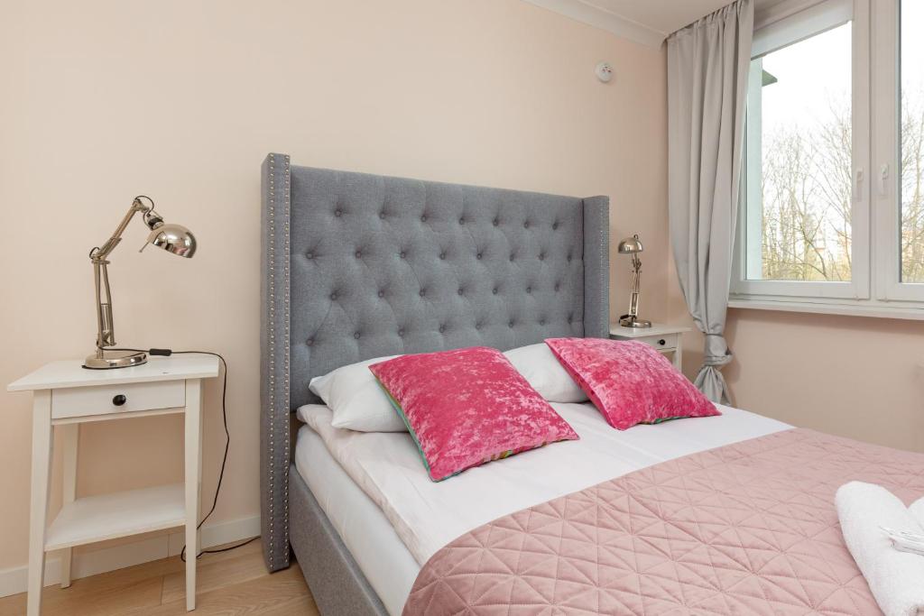 Posteľ alebo postele v izbe v ubytovaní Apartment Praga Afrykańska by Noclegi Renters