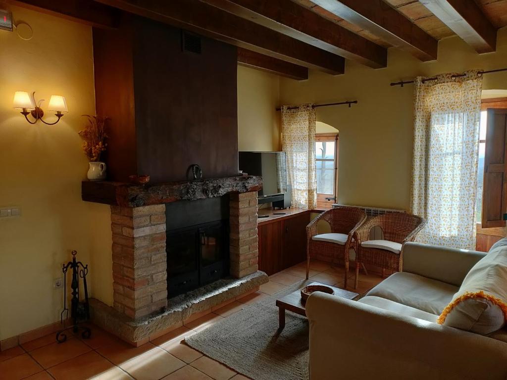 TV a/nebo společenská místnost v ubytování Casa Serra de Dalt