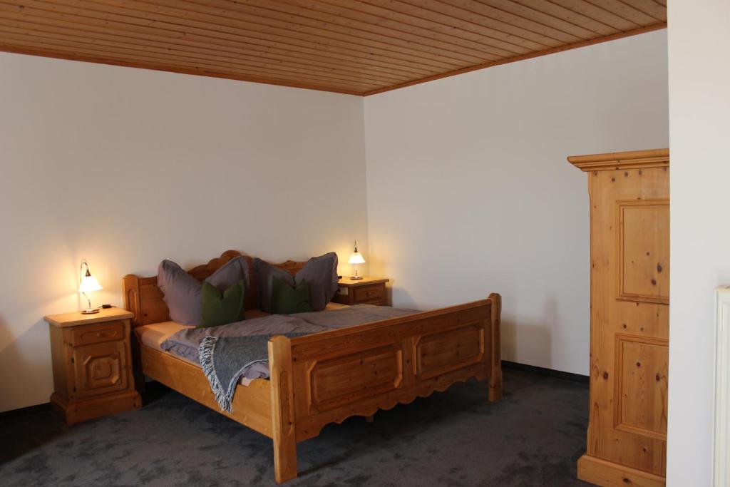 Postel nebo postele na pokoji v ubytování s' Berghäusl Randeck
