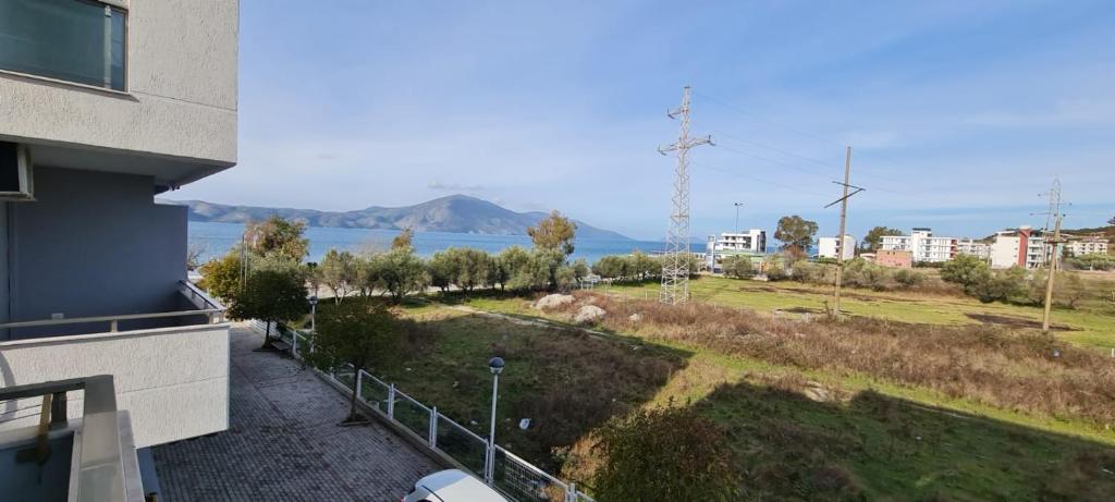 a balcony of a building with a view of the water at Sea View apartment in Vlorë