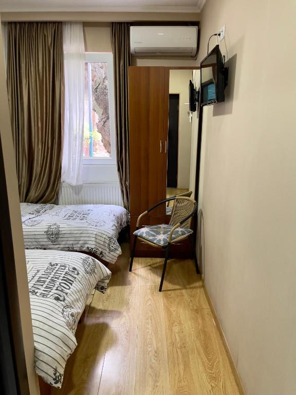 Postel nebo postele na pokoji v ubytování Hotel Maria