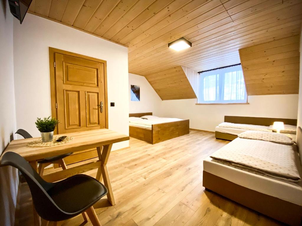 Postel nebo postele na pokoji v ubytování Agroturystyka Pod Jodłami