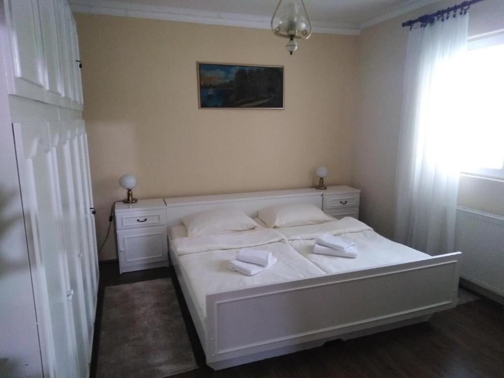Кровать или кровати в номере Mala bašta