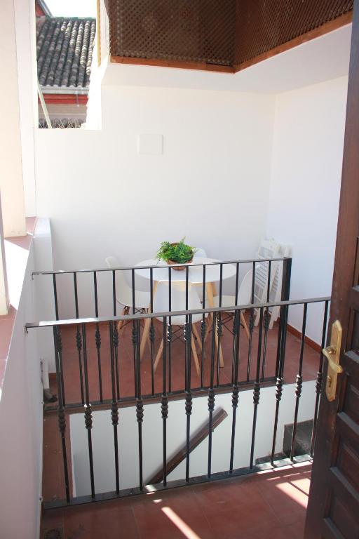Postel nebo postele na pokoji v ubytování Zahira Suites