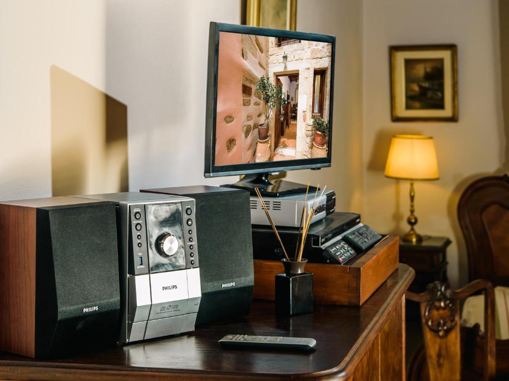 TV a/nebo společenská místnost v ubytování Casa Di Veneto