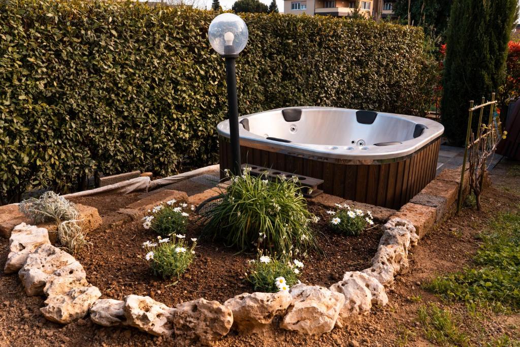 Vonkajšia záhrada v ubytovaní La Gardenia