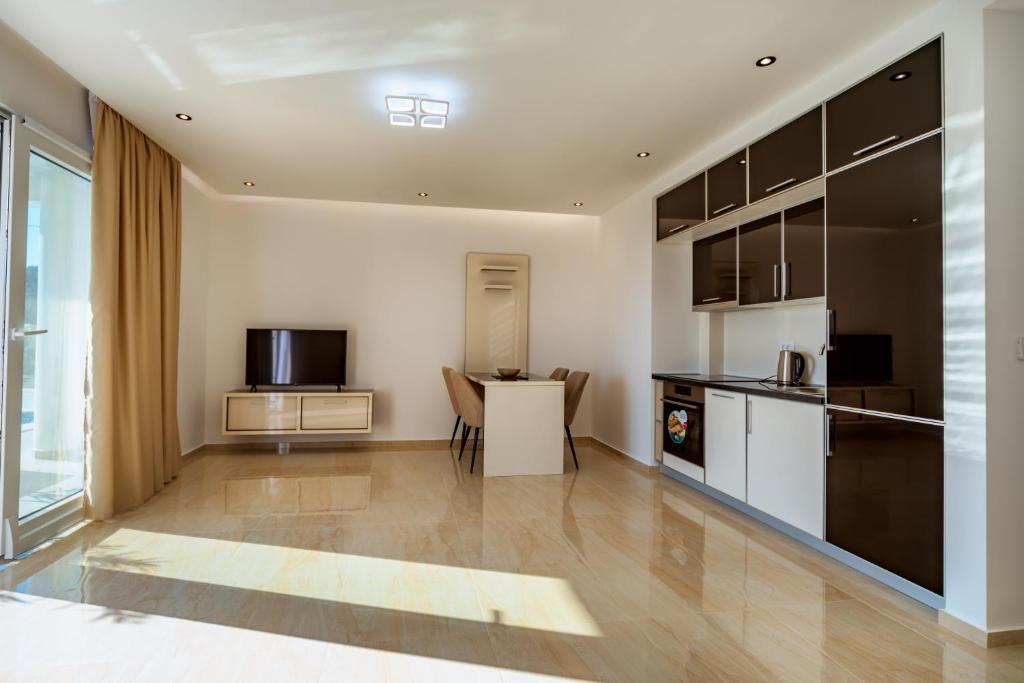 Kuchyň nebo kuchyňský kout v ubytování Hotel MS