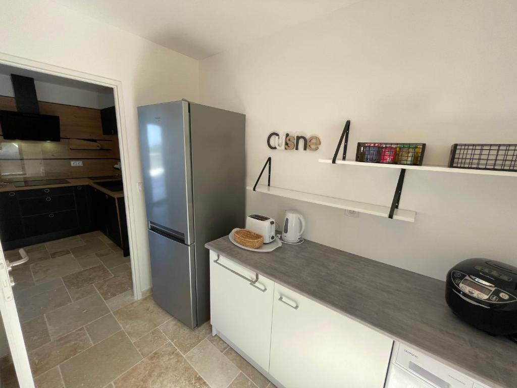 Cuisine ou kitchenette dans l'établissement Gîte du point de vue