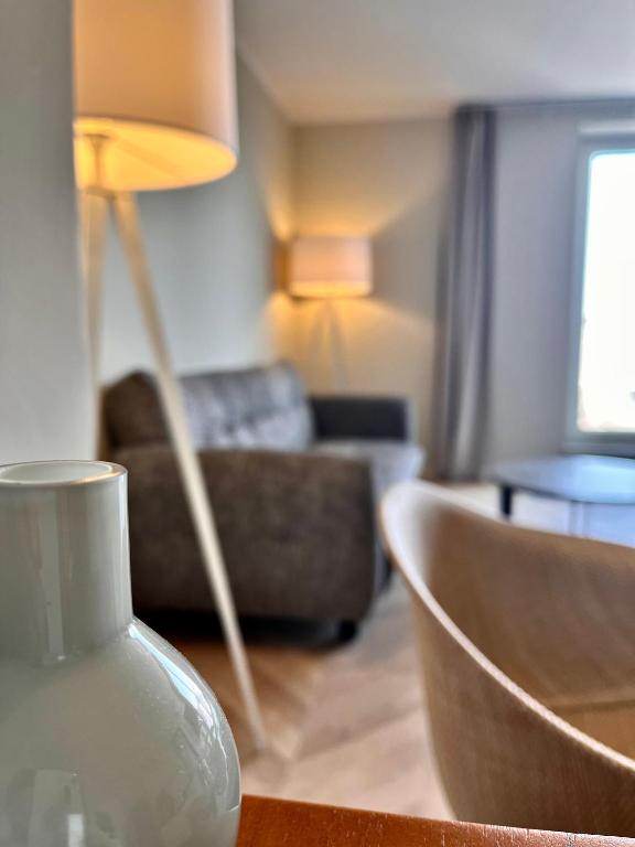 Posezení v ubytování QU Hotel Augsburg