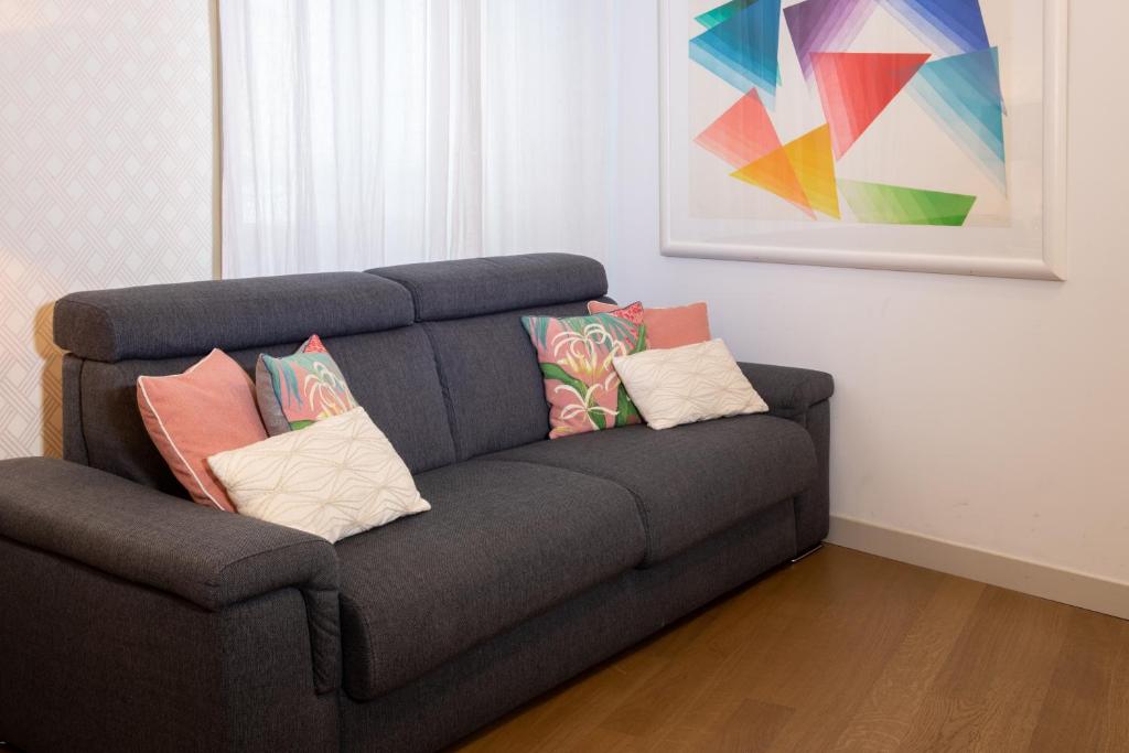 A seating area at Madeleine apartments - Brera