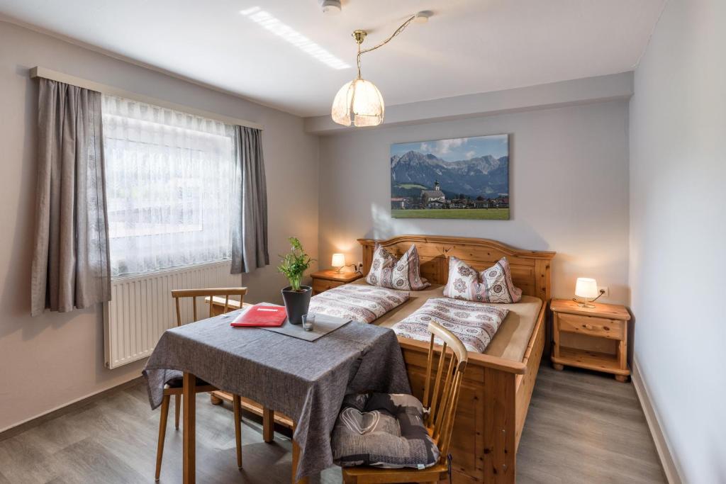 Postel nebo postele na pokoji v ubytování Pension Feichter
