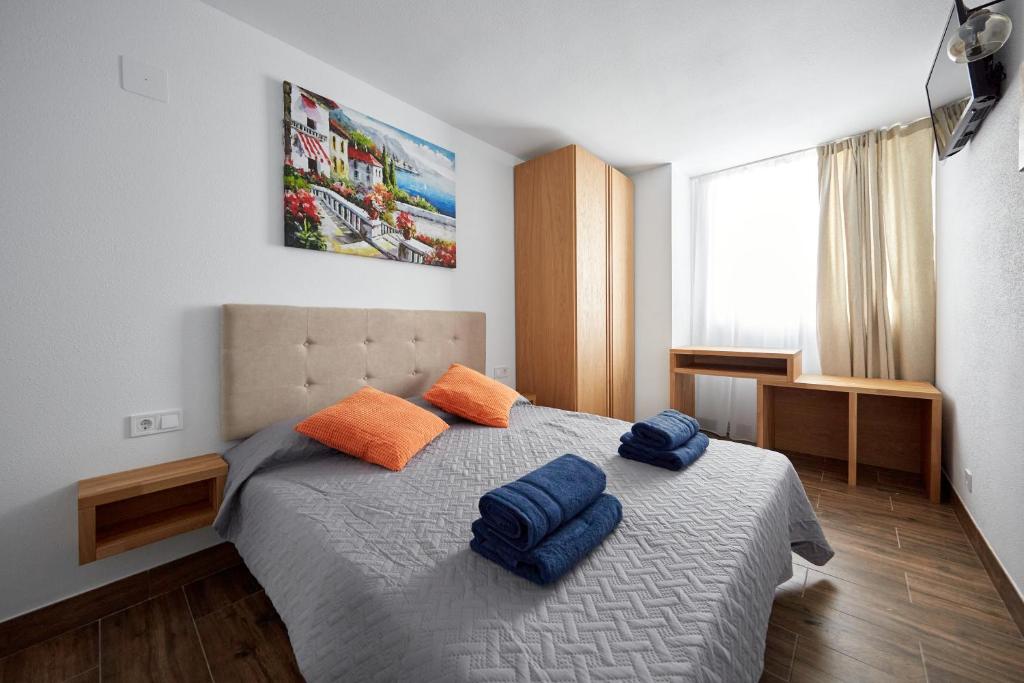 Postel nebo postele na pokoji v ubytování El Patio Hostal