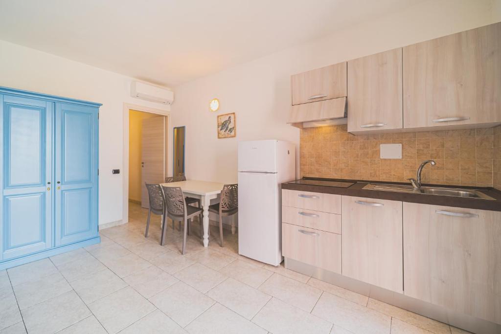 Kuchyň nebo kuchyňský kout v ubytování Residence Villa Rosi