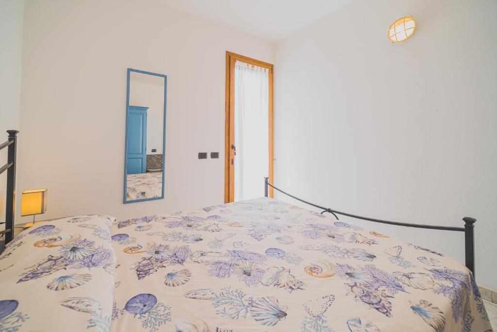 Postel nebo postele na pokoji v ubytování Residence Villa Rosi