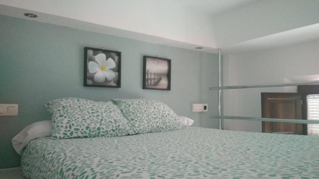 A bed or beds in a room at Estudio San Matias