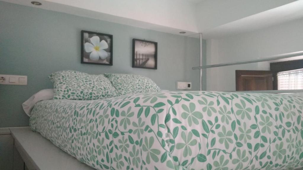 A bed or beds in a room at Estudio San Matias
