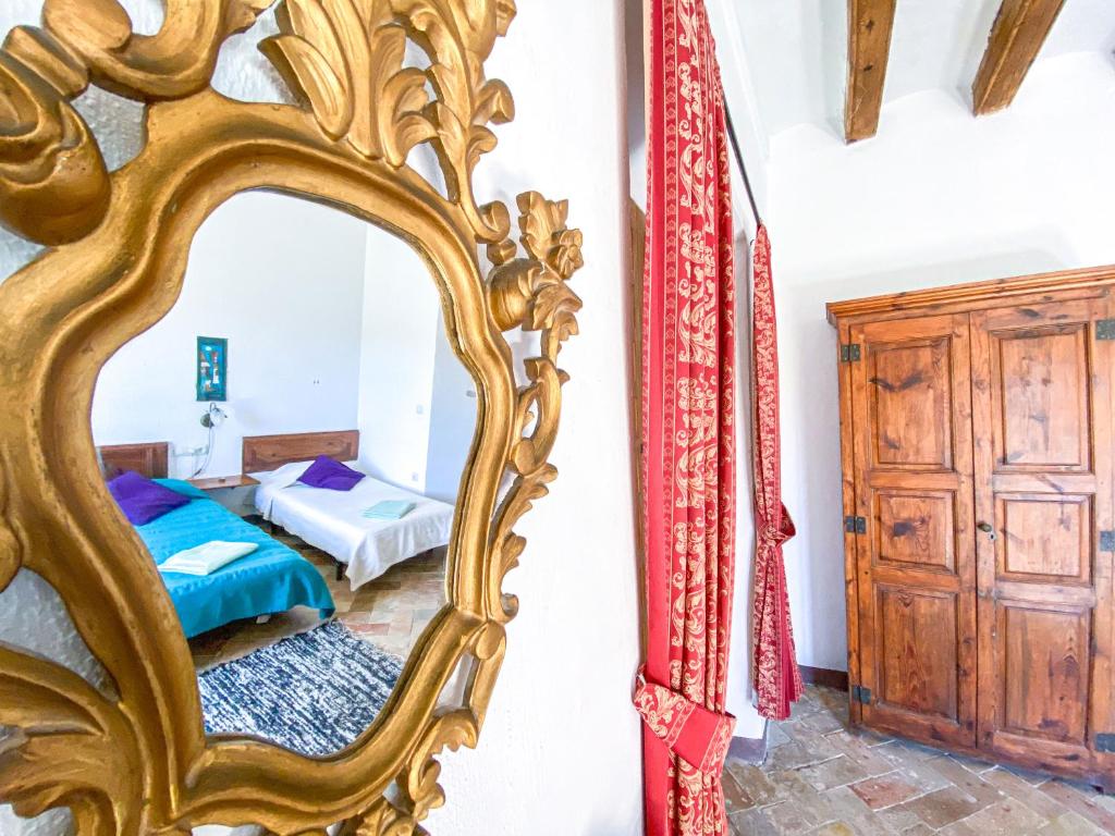 Postel nebo postele na pokoji v ubytování Casa Rural Sant Petrus de Madrona