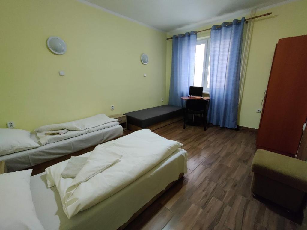 A bed or beds in a room at Rekreačné zariadenie Javorinka