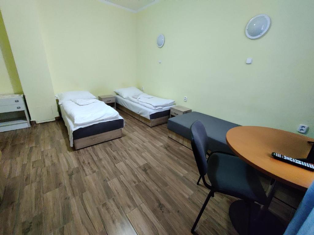 A bed or beds in a room at Rekreačné zariadenie Javorinka