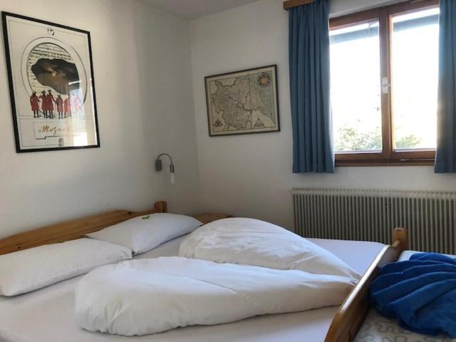 Postel nebo postele na pokoji v ubytování CHALET MARESI
