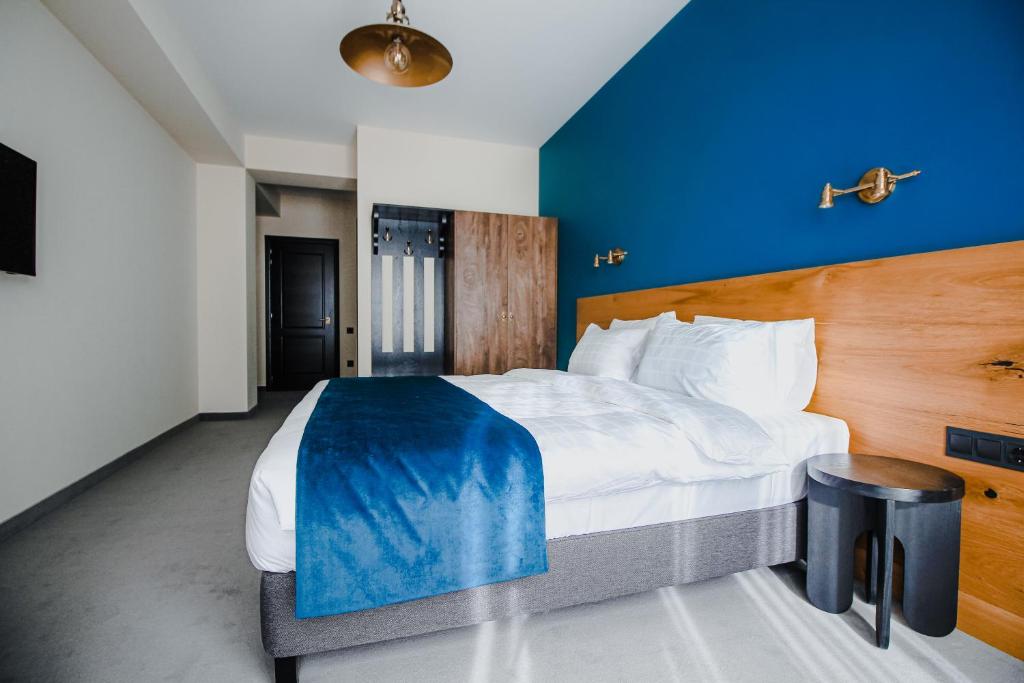 Una cama o camas en una habitación de Suatis Resort Kazbegi
