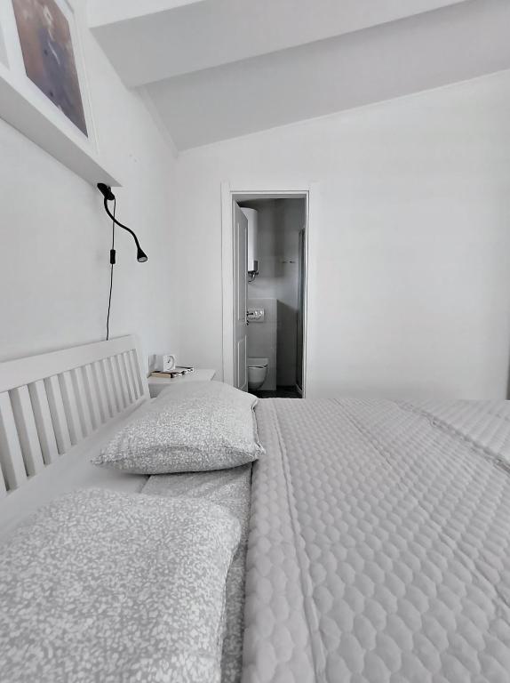 Posteľ alebo postele v izbe v ubytovaní Family Apartment Marton