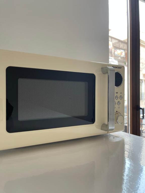 Kuchyň nebo kuchyňský kout v ubytování Carmela Apartment.