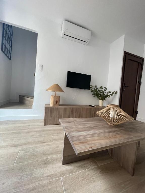 TV a/nebo společenská místnost v ubytování Carmela Apartment.