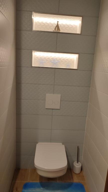 Koupelna v ubytování Gamma Apartmanok és Jakuzzi