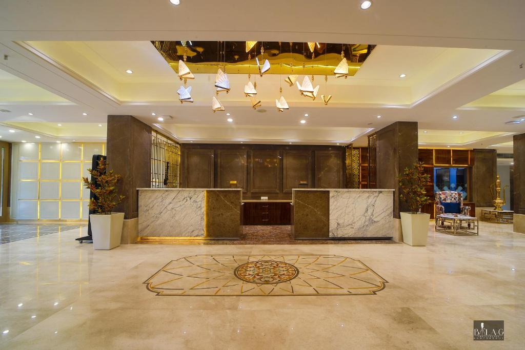 Lobbyn eller receptionsområdet på Hotel Holy Vivasa