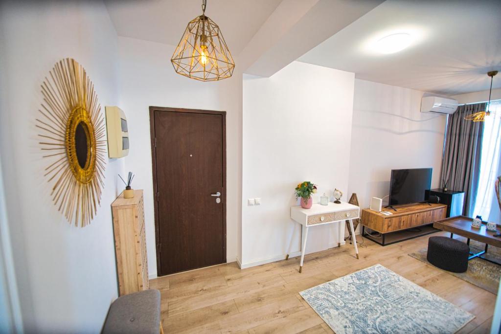 TV a/nebo společenská místnost v ubytování Oxygen Residence Sea View 38