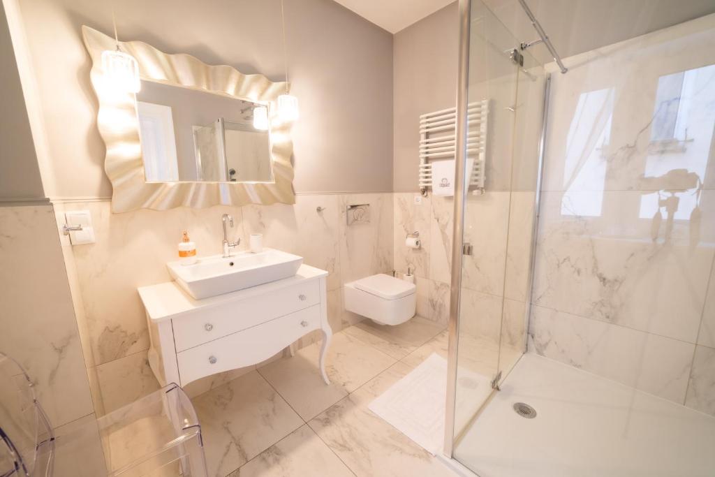 Kúpeľňa v ubytovaní Apartamenty Pod Zegarem