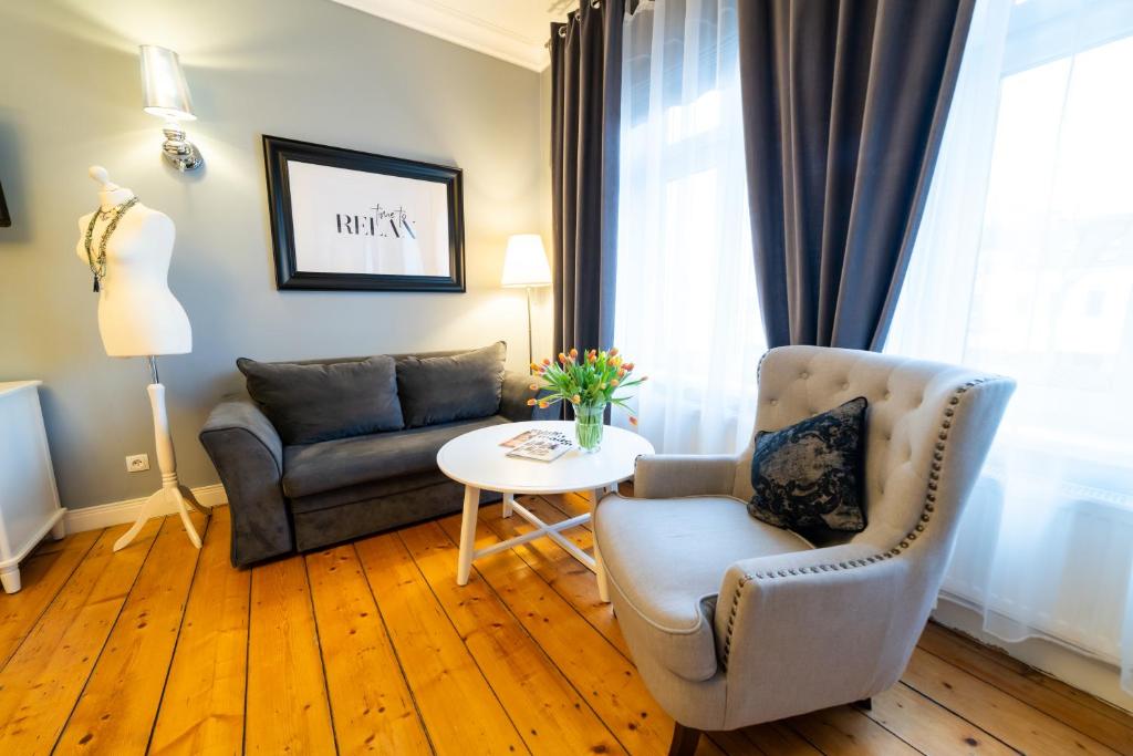 Posedenie v ubytovaní Apartamenty Pod Zegarem