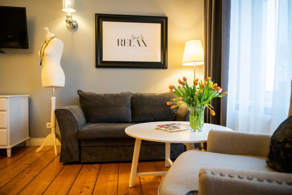 Posedenie v ubytovaní Apartamenty Pod Zegarem