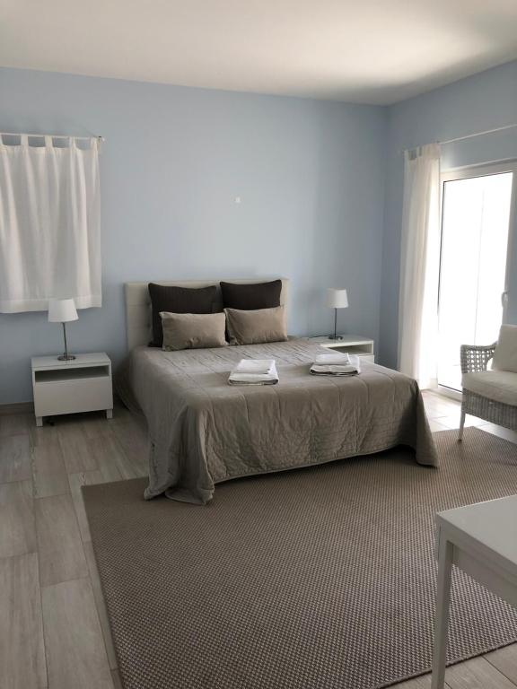 Cama ou camas em um quarto em Casa da Mondina Comporta