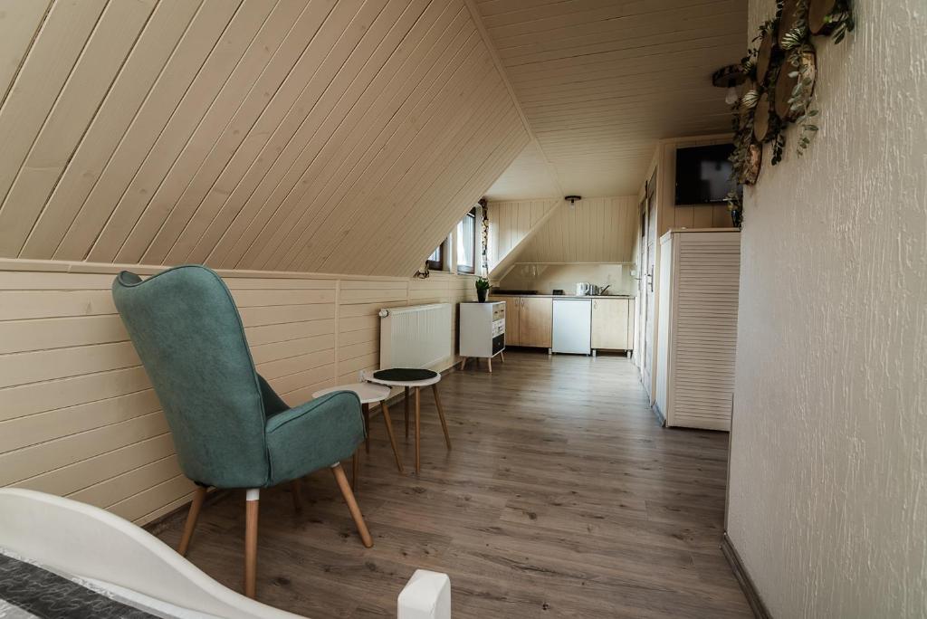 Posedenie v ubytovaní Apartamenty na wzgórzu