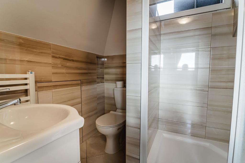 Kúpeľňa v ubytovaní Apartamenty na wzgórzu