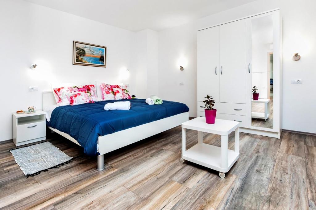 Łóżko lub łóżka w pokoju w obiekcie Holiday Home Fradelani