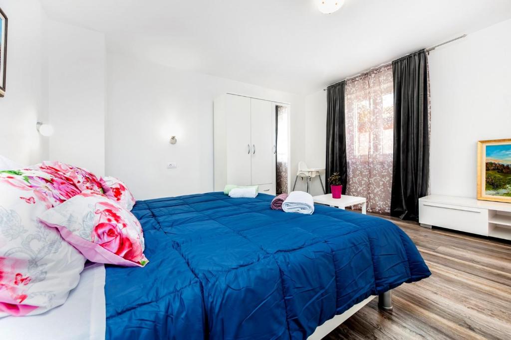 Łóżko lub łóżka w pokoju w obiekcie Holiday Home Fradelani